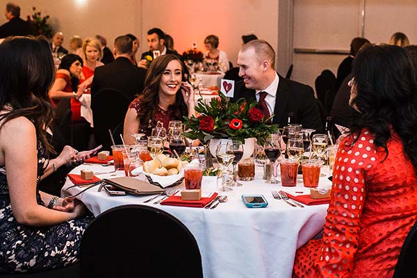 Heart Gala Table of People Laughing