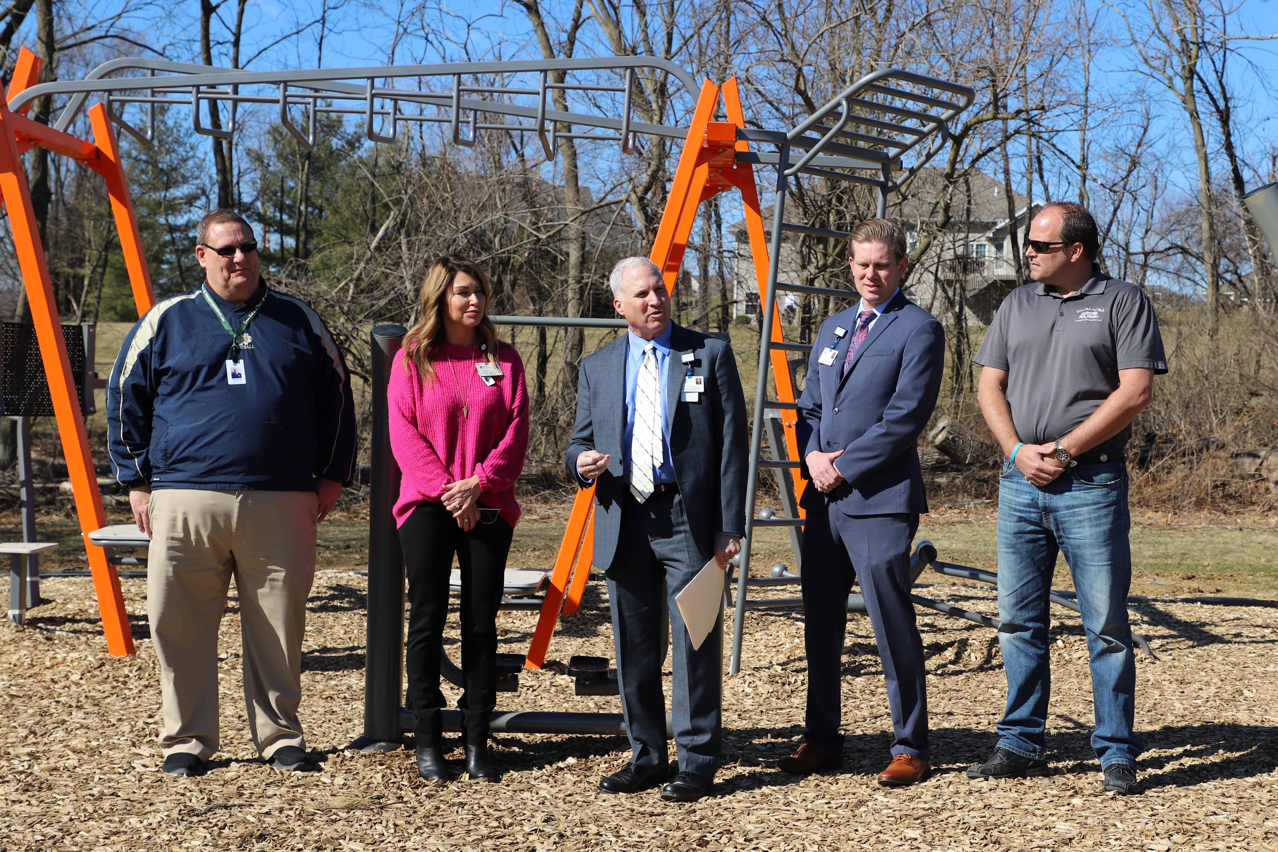 Blessing and Park District team members in front of equipment