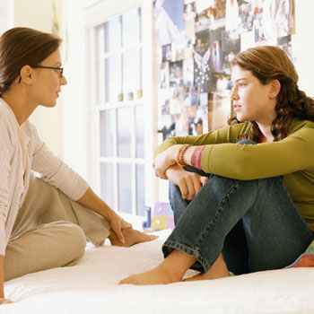 mom talking to daughter