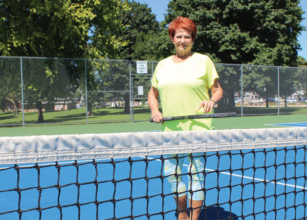 Woman on tennis court