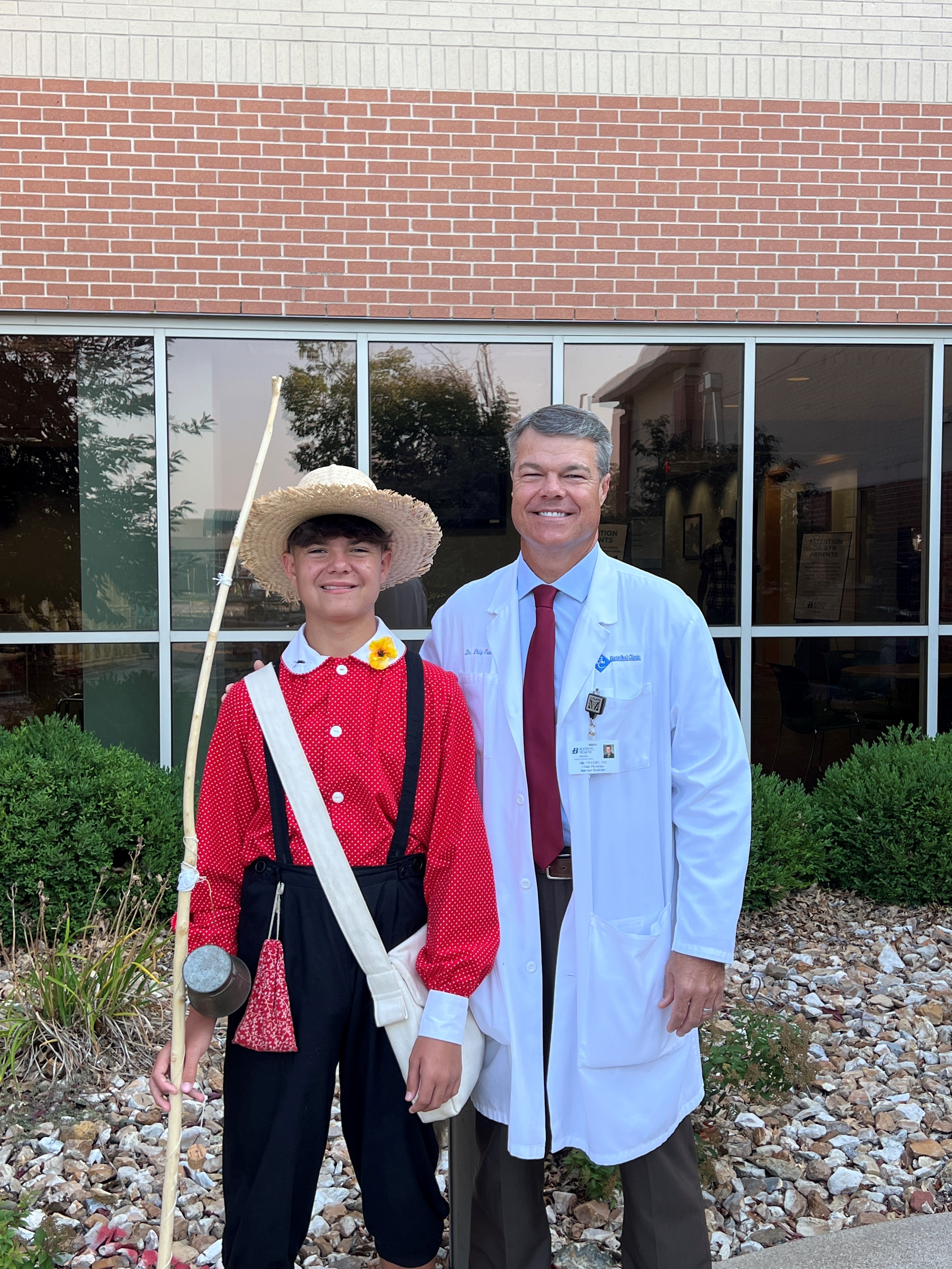 Dr. Philip Tweedy and son as Tom Sawyer 