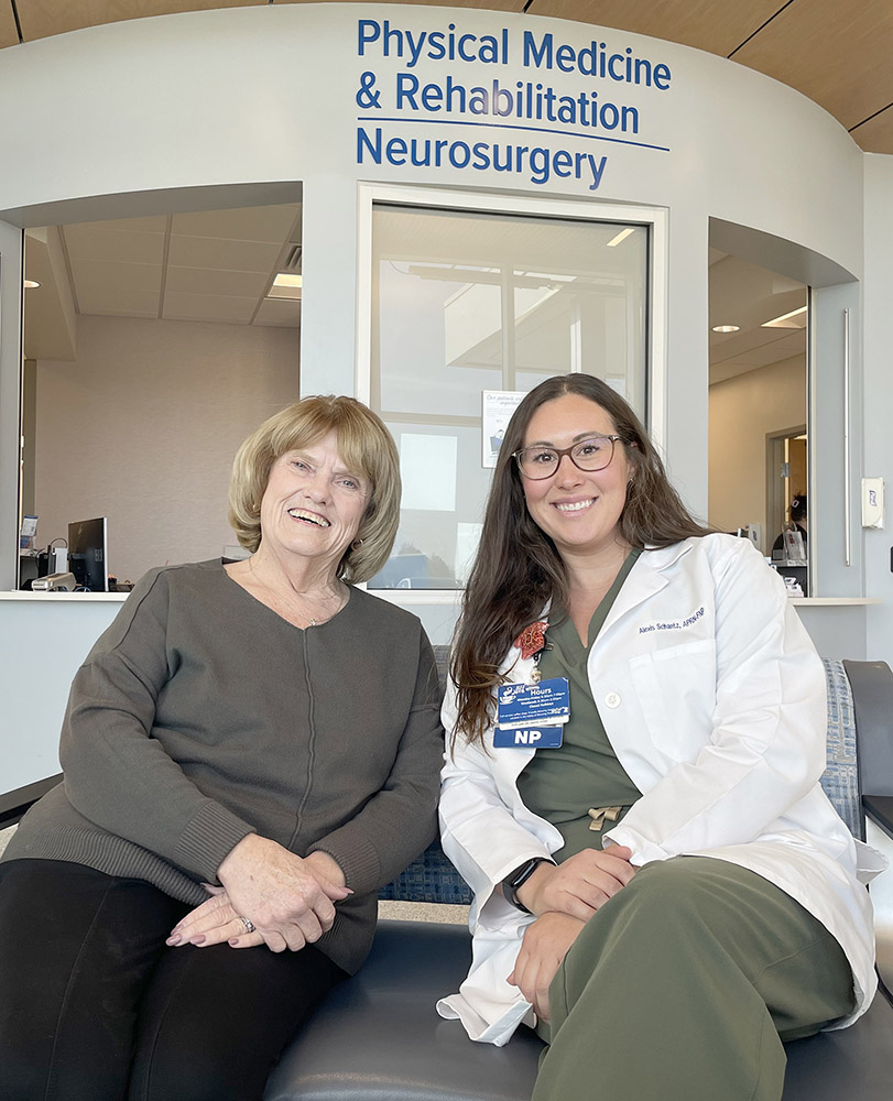 Arlis DeJaynes at left and Alexis Schantz Blessing Spine Center Nurse Practitioner