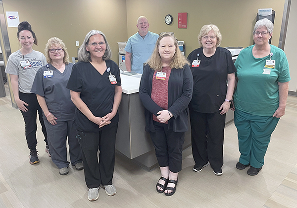 In the photo, front row, left to right are Pre-Surgical Anesthesia Clinic team members Alyssa Morse, Cathy Prunty, Roseann Hugenberg, Michelle Van Blair, Kathy Bracy and Judy Tournear. Back row: Shannon Walker.