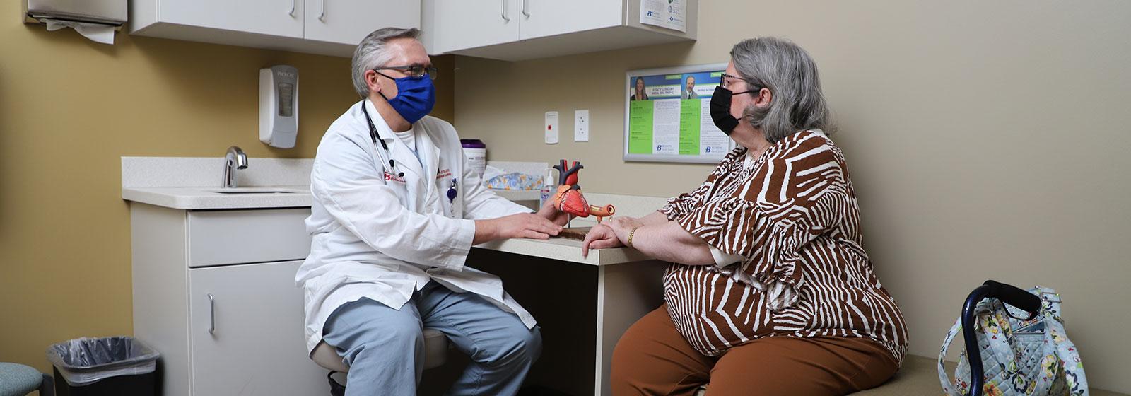 Dr. Krause talking to patient