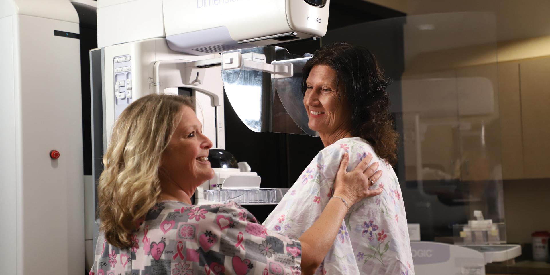 breast center team talking with patient