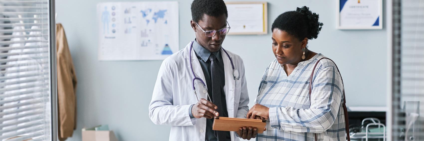 Doctor speaking with lady